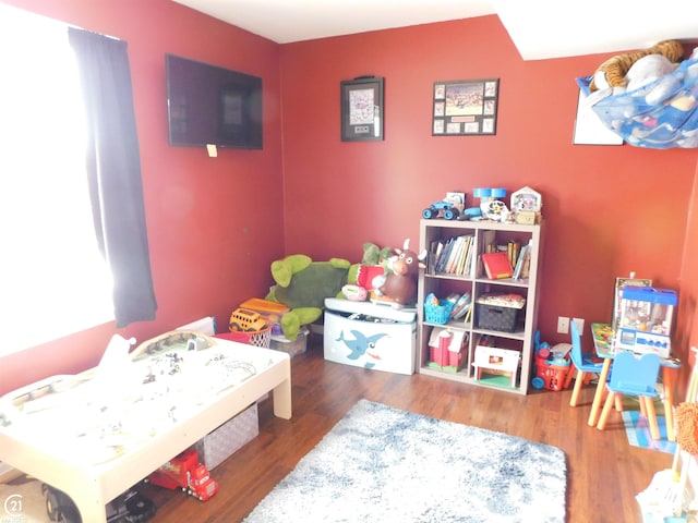 bedroom featuring wood finished floors