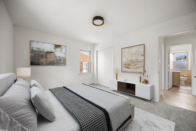 bedroom with a closet and carpet flooring