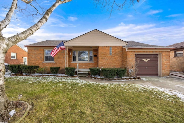 ranch-style house featuring an attached garage, brick siding, concrete driveway, roof with shingles, and a front yard