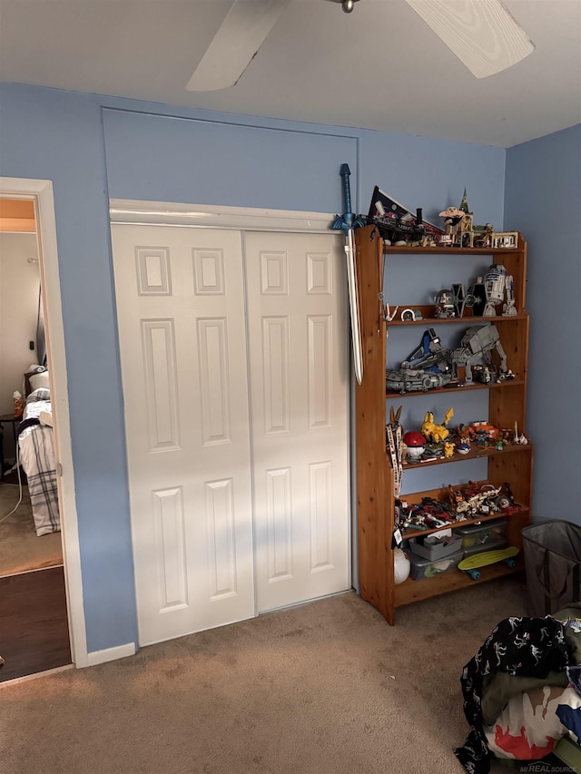 carpeted bedroom with a closet