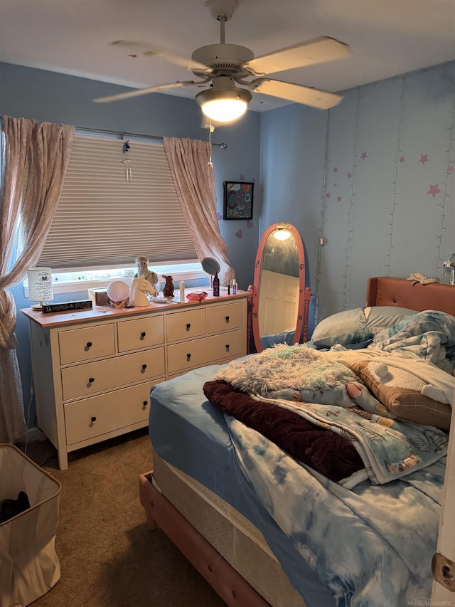 carpeted bedroom with a ceiling fan