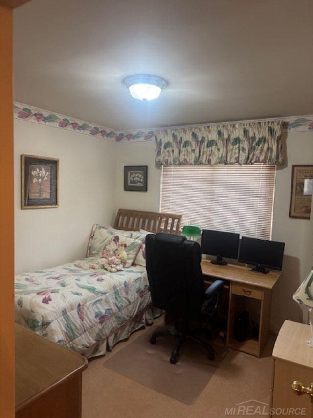 bedroom featuring carpet flooring