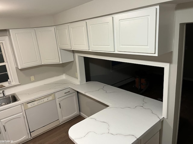 kitchen featuring a sink, white dishwasher, white cabinetry, and dark wood-style flooring