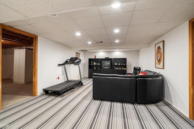 living room with recessed lighting, light carpet, visible vents, and baseboards