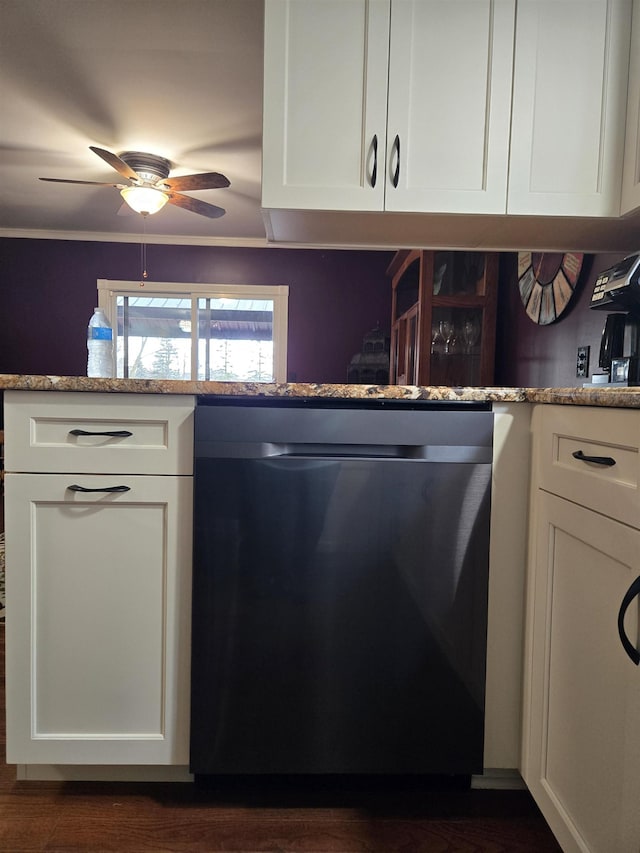 kitchen featuring stainless steel dishwasher, a ceiling fan, light stone counters, and white cabinets