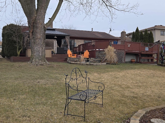 view of yard featuring a wooden deck