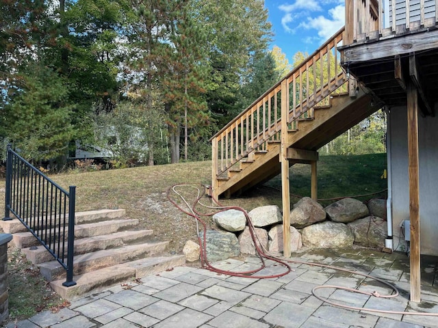 exterior space with a patio and stairway