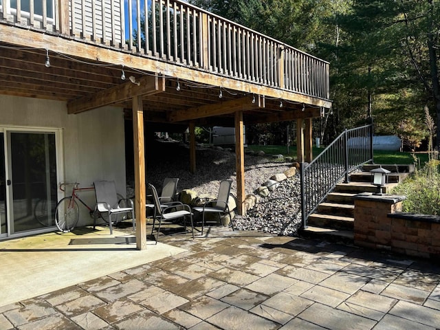 view of patio / terrace featuring stairs