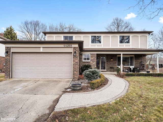 view of front of house featuring a porch, concrete driveway, brick siding, and a front lawn