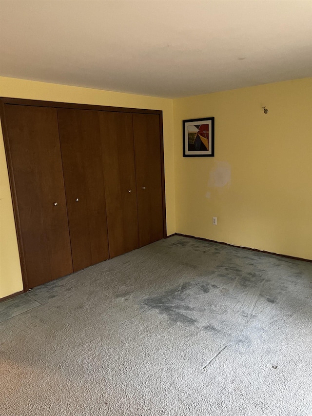 unfurnished bedroom with carpet