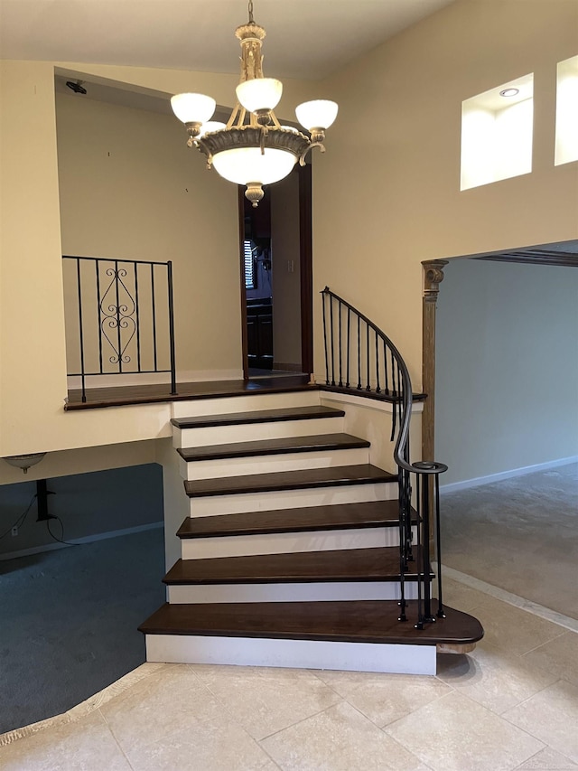 stairway with carpet and baseboards