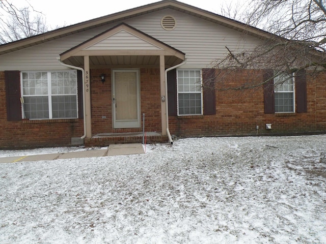 view of front of property with brick siding