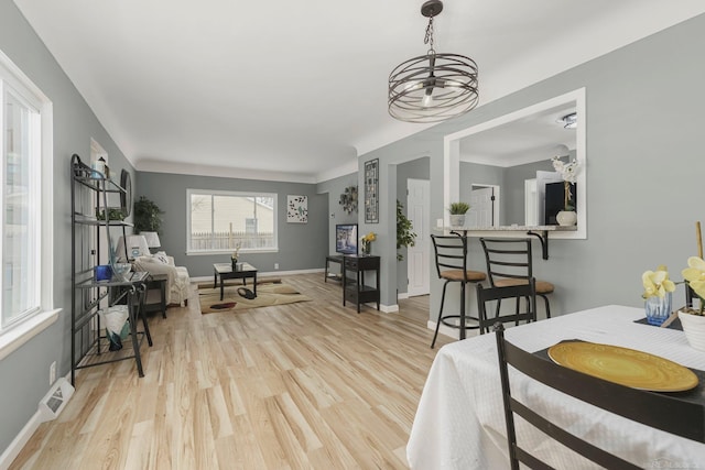 interior space with light wood-style flooring and baseboards