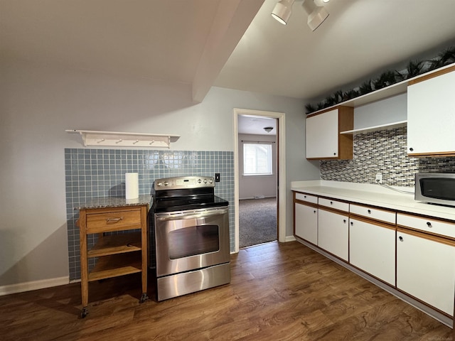 kitchen featuring white cabinets, dark wood-style floors, stainless steel appliances, light countertops, and open shelves