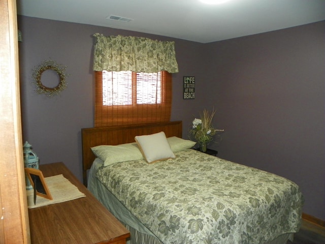 bedroom with visible vents