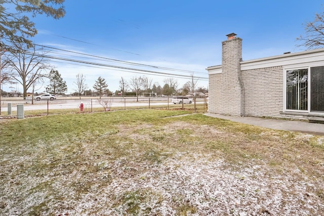 view of yard with fence