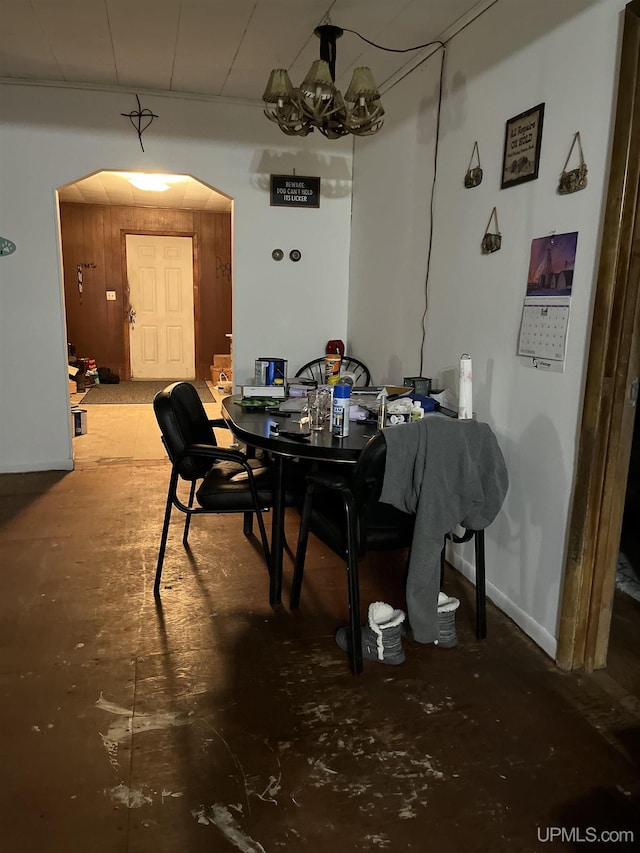 dining room with arched walkways