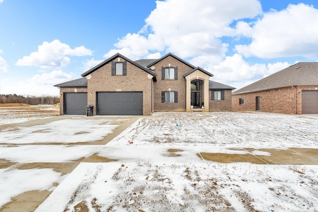 view of front of house featuring brick siding