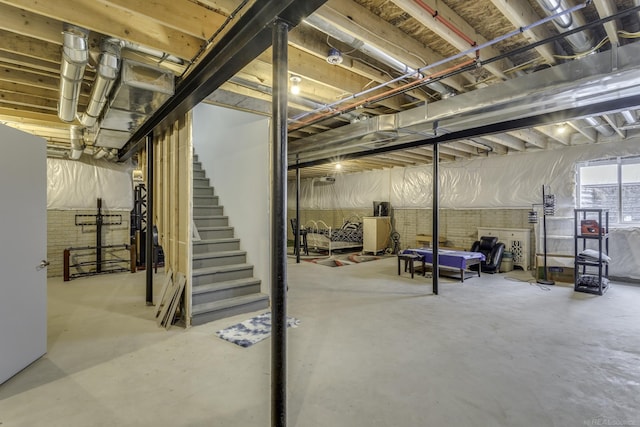 basement featuring stairway