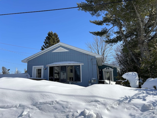 view of snow covered garage