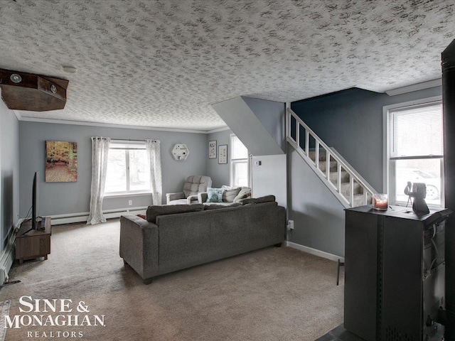 carpeted living room with crown molding, a baseboard heating unit, a textured ceiling, baseboards, and stairs