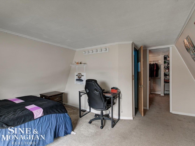 bedroom with carpet, crown molding, a textured ceiling, and baseboards