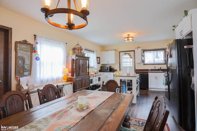 dining room featuring dark wood-style flooring