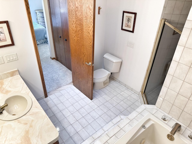 full bath with a tub to relax in, toilet, tile patterned flooring, a tile shower, and vanity