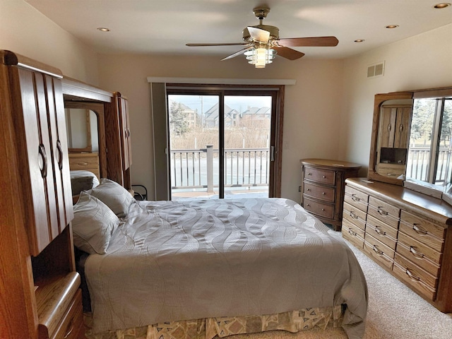 bedroom featuring visible vents, a ceiling fan, light colored carpet, access to exterior, and recessed lighting