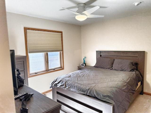 bedroom featuring carpet floors, ceiling fan, and baseboards