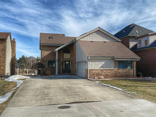 view of front of house featuring driveway, brick siding, roof with shingles, and a front lawn