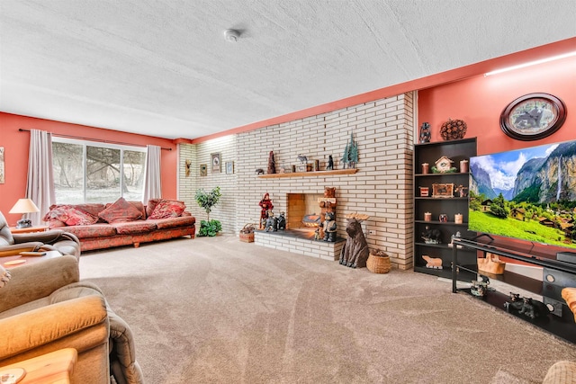 carpeted living area with a textured ceiling, brick wall, and a brick fireplace