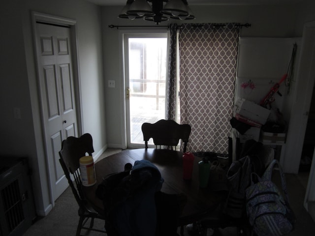 dining area featuring baseboards