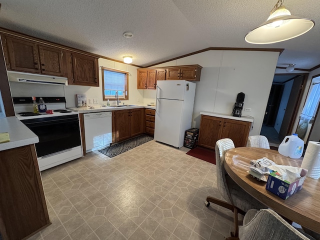 kitchen featuring a sink, ventilation hood, white appliances, light countertops, and lofted ceiling