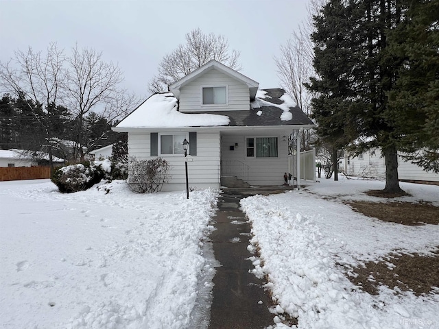 view of front of house with fence