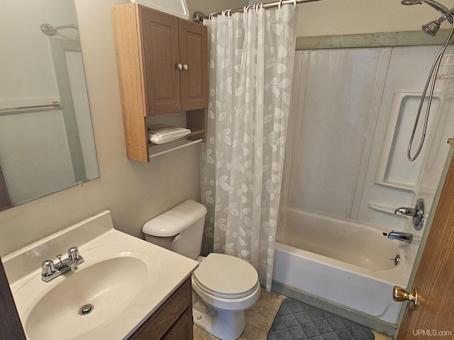 full bath featuring toilet, shower / bath combo with shower curtain, and vanity