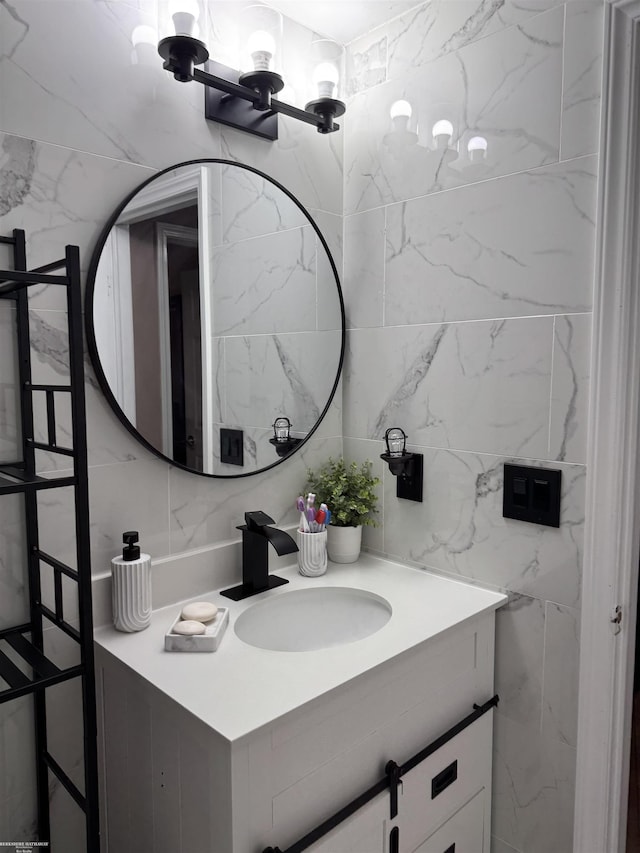 bathroom with tile walls and vanity