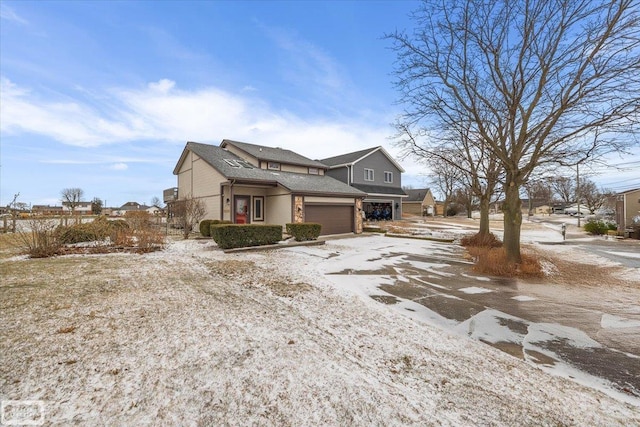 view of front of property featuring an attached garage