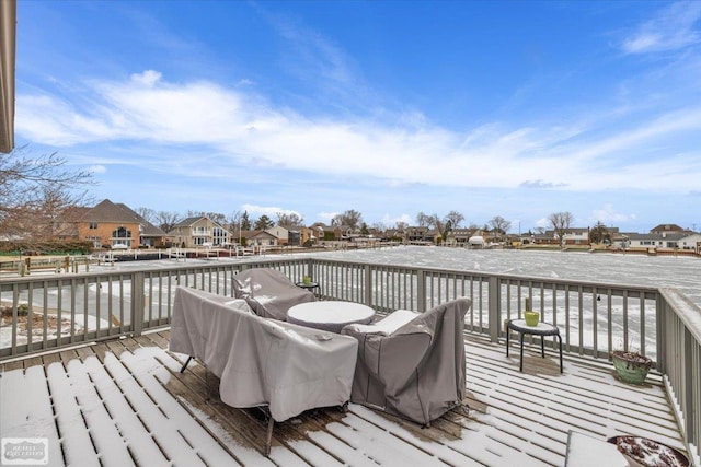 wooden terrace featuring a residential view