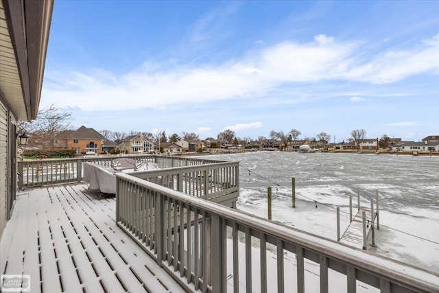 wooden deck featuring a residential view