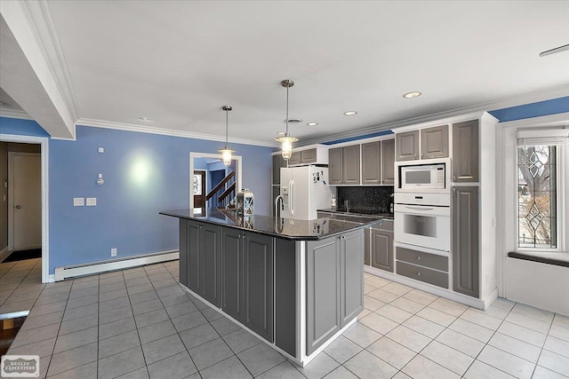 kitchen featuring white appliances, tasteful backsplash, baseboard heating, crown molding, and light tile patterned flooring