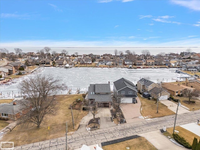 birds eye view of property with a residential view