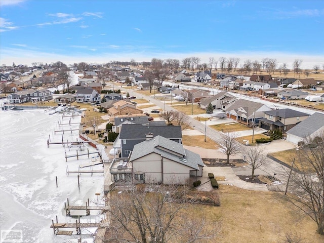 birds eye view of property with a residential view