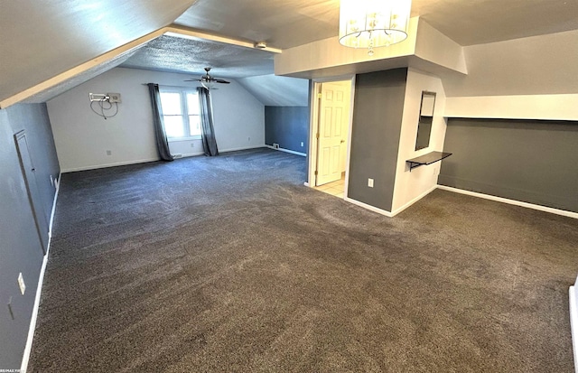 bonus room with vaulted ceiling, ceiling fan, baseboards, and carpet floors