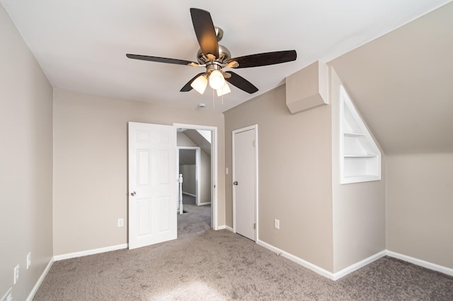 bonus room with carpet and baseboards