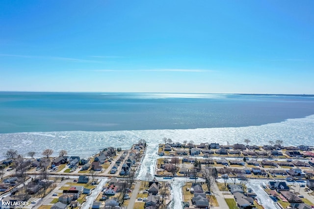 aerial view featuring a residential view and a water view