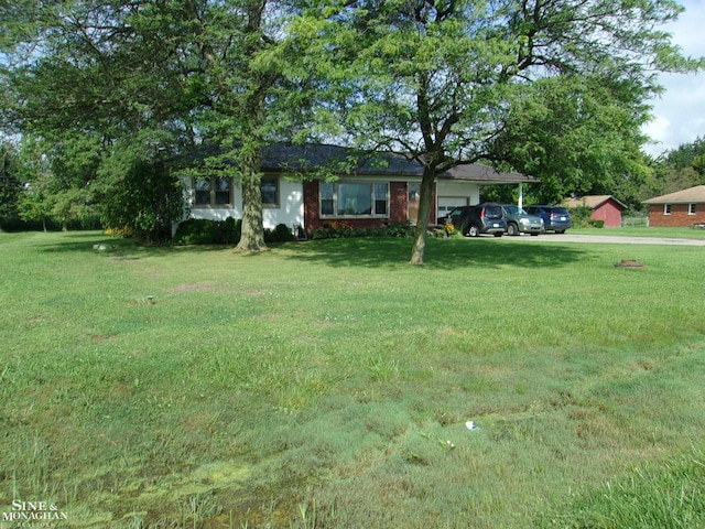 view of yard with a garage