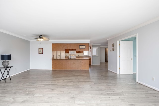25540 Waterview Dr, Harrison Twp, MI 48045 - unfurnished living room with baseboards, ornamental molding, and light wood-type flooring