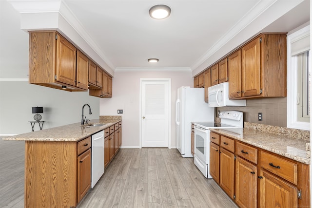 25540 Waterview Dr, Harrison Twp, MI 48045 - kitchen with brown cabinetry, ornamental molding, white appliances, light wood-type flooring, and a sink