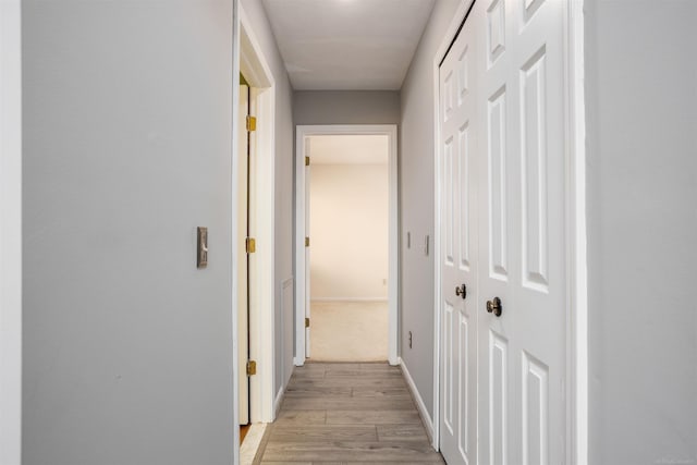 25540 Waterview Dr, Harrison Twp, MI 48045 - hall with baseboards and light wood-style flooring